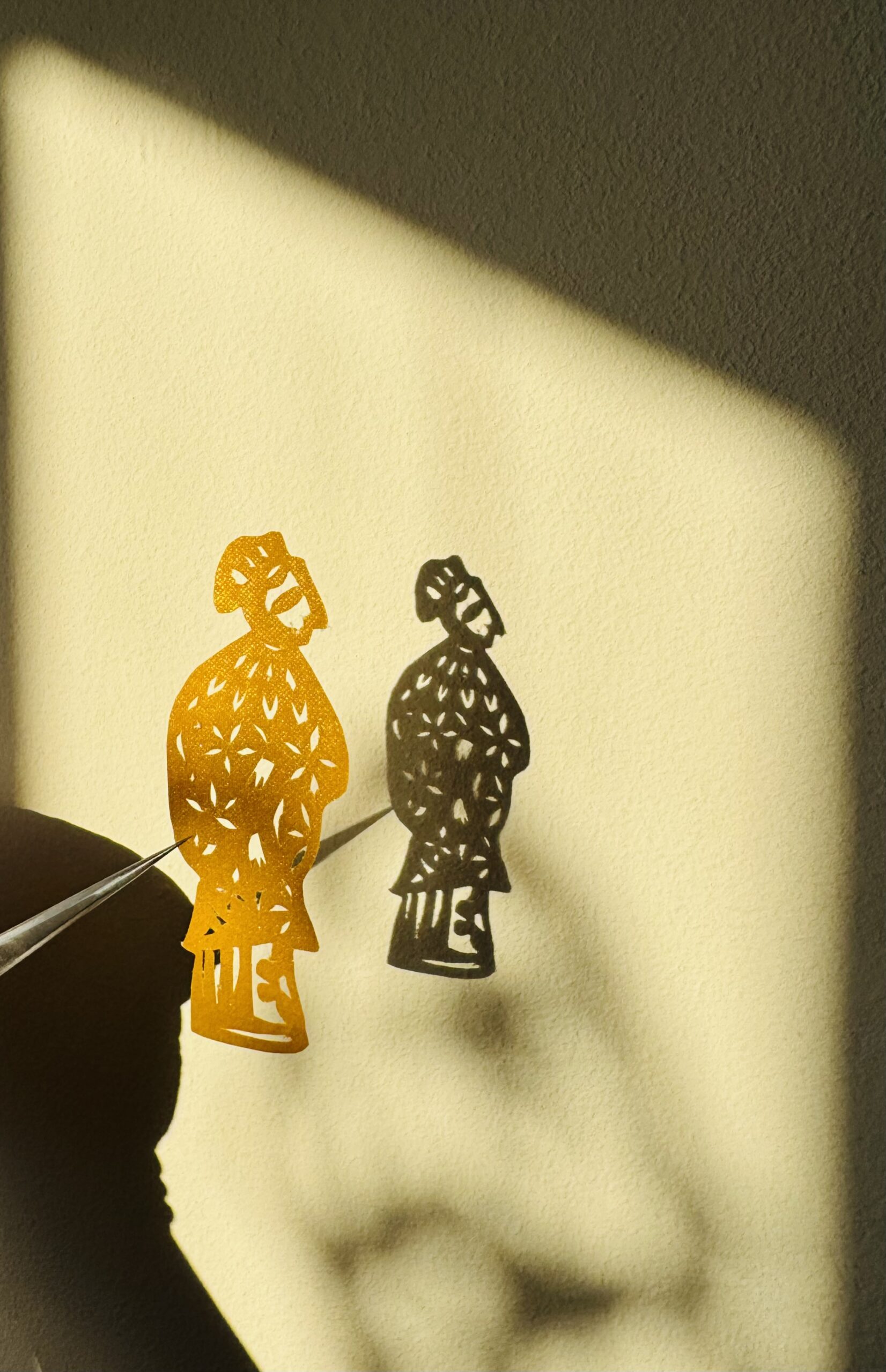 papercutting of a lady in chinese dress